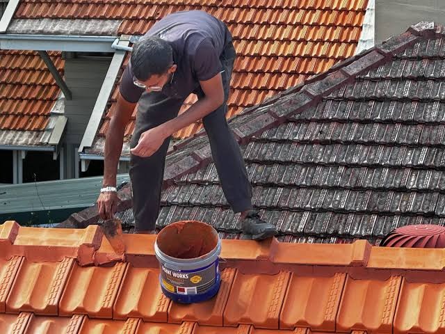 terracotta tile roof restoration in progress